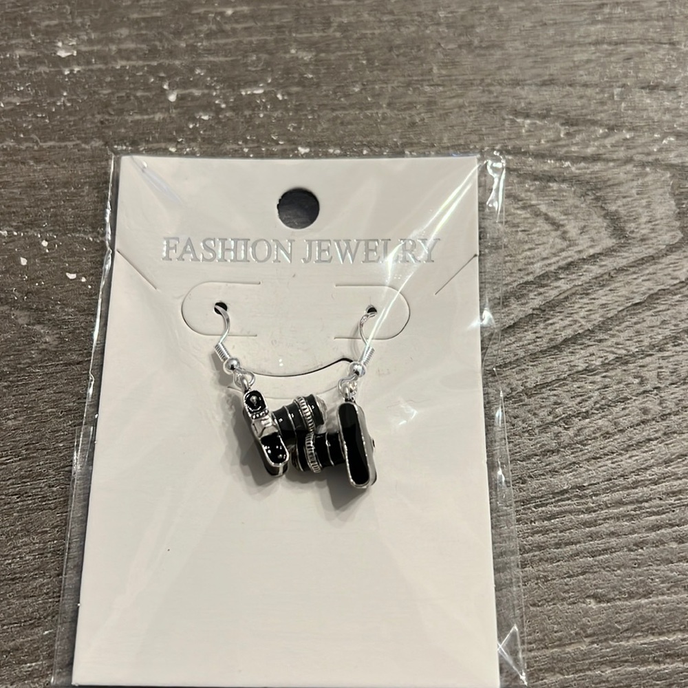 Camera earrings new never worn